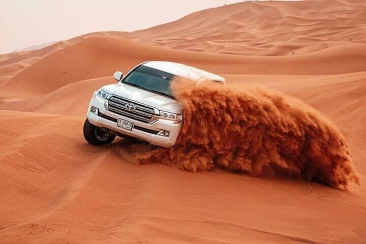 Private 6-Hour Dubai Desert Safari with Dune Bashing, Camel Ride & BBQ Dinner