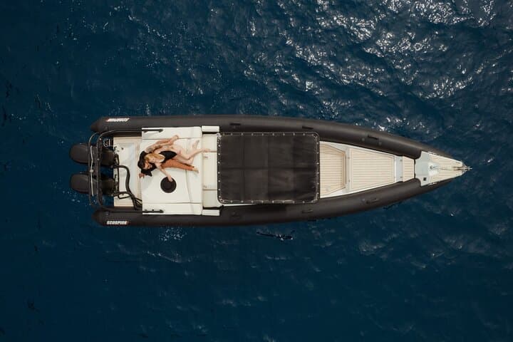 Private Half-Day Motor Boat Cruise in Santorini: Caldera, Hot Springs & Thirassia