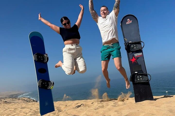 Sunset Sandboarding near Agadir: Dune Runs with Ocean Views