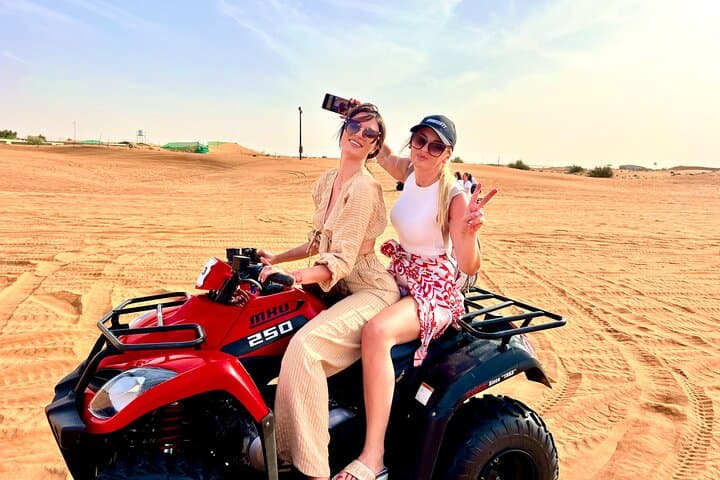 VIP Dubai Desert Safari: Camel Ride, Quad Bike, Dune Bashing & BBQ photo 1