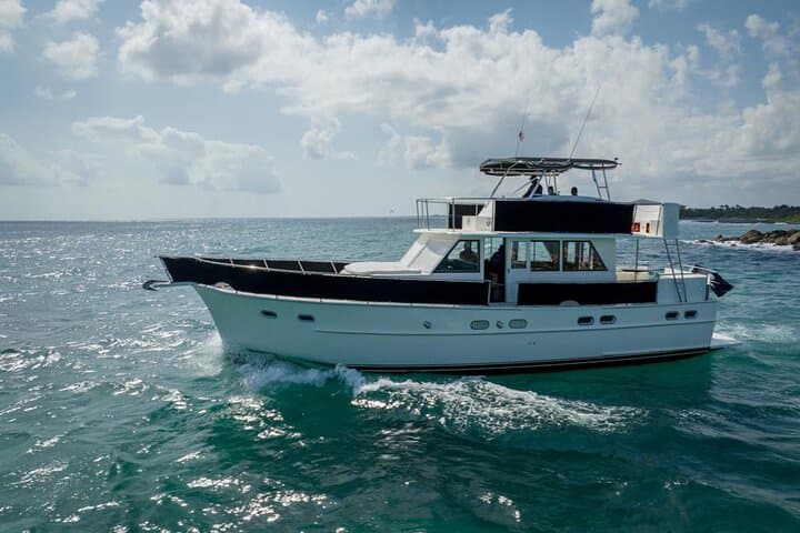 Sunset Snorkel Cruise on a 53' Hatteras — Riviera Maya Evening Escape photo 2
