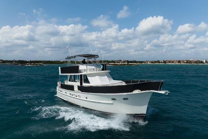 Sunset Snorkel Cruise on a 53' Hatteras — Riviera Maya Evening Escape photo 3