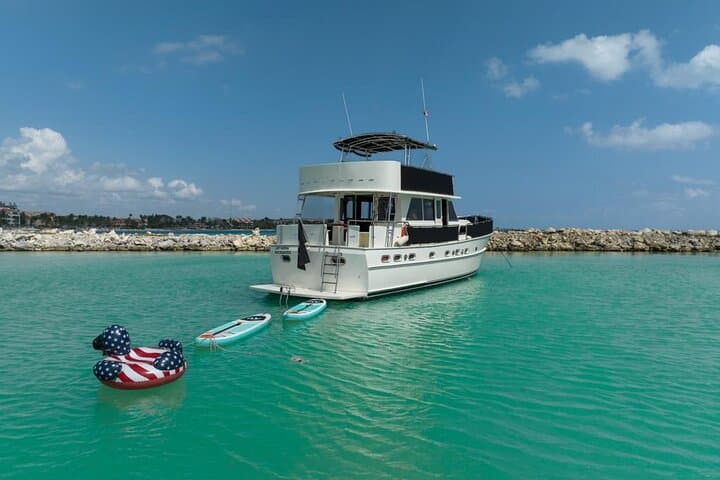 Sunset Snorkel Cruise on a 53' Hatteras — Riviera Maya Evening Escape photo 4