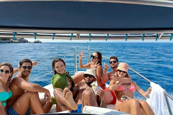 Private VIP Boat Tour of Capri: Blue Grotto, Faraglioni & Snorkel