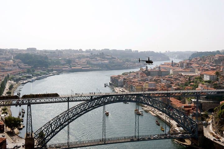 Helicopter Tour Over Foz do Douro and Porto: Aerial Views of the Douro Mouth and Historic Bridges photo 2