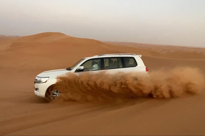 Dubai Red Dunes Morning Safari: Quad Bike, Dune Bashing & Camel Ride photo 4