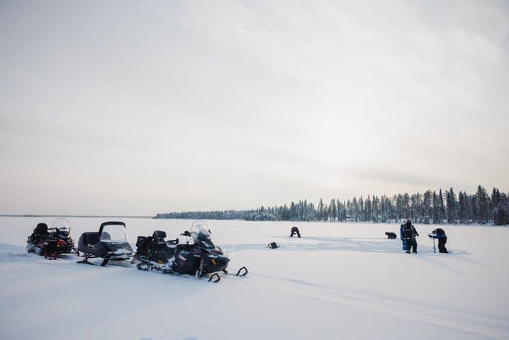 Snowmobile Safari and Ice Fishing in Rovaniemi: Lapland Winter Adventure