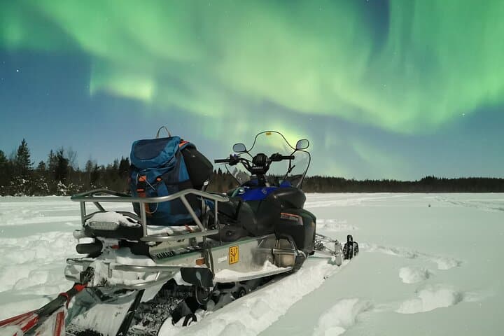 Chasing the Northern Lights: Snowmobile Safari in Lapland's Arctic Wilderness photo 2