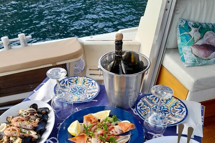 Private Taormina Boat Tour with Aperitif — Isola Bella, Blue Grotto & Marine Reserve photo 4