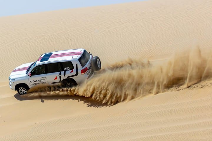 Full-Day Qatar Desert Safari: Dune Bashing, Sandboarding & Inland Sea Day Pass photo 1