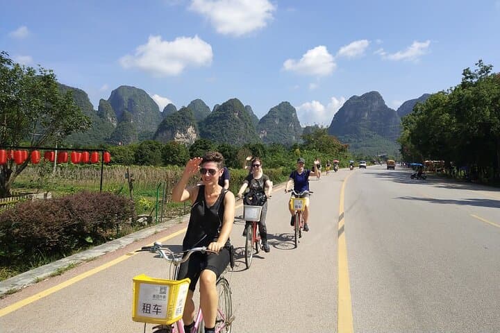 Yangshuo Full-Day Cycling, Yulong River Bamboo Raft & Impression Sanjie Liu photo 1