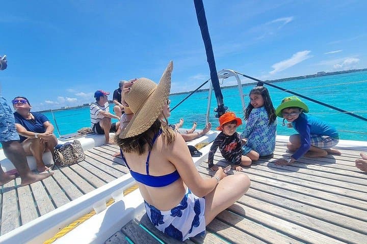 Luxury Catamaran to Isla Mujeres with Beach Club & Snorkeling photo 1