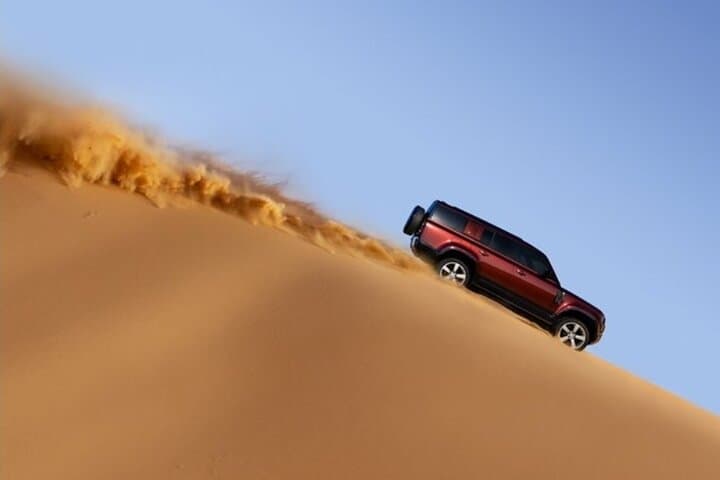 Dubai High Red Dunes Desert Safari — Dune Bashing, Sandboarding & Bedouin BBQ