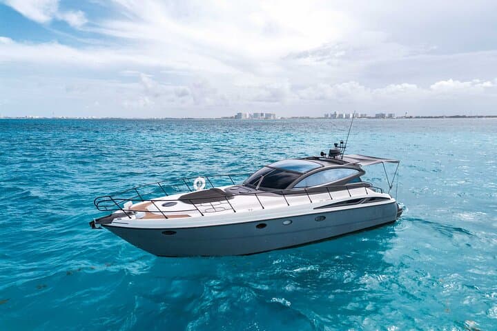 9-Hour Private Yacht Cruise from Cancun: Coast & Fun Snorkel, Chef & Islands photo 1