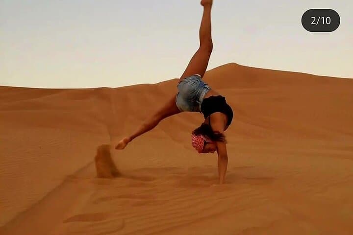 Dubai VIP Desert Safari with Quad Biking, Camel Ride & BBQ Dinner photo 4