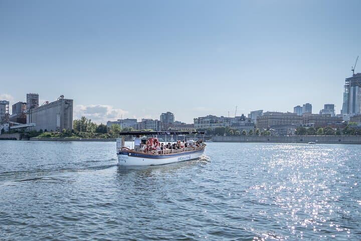 Silent Electric Boat Cruise in Montreal: Guided Waterfront Tour with Onboard Drinks photo 3