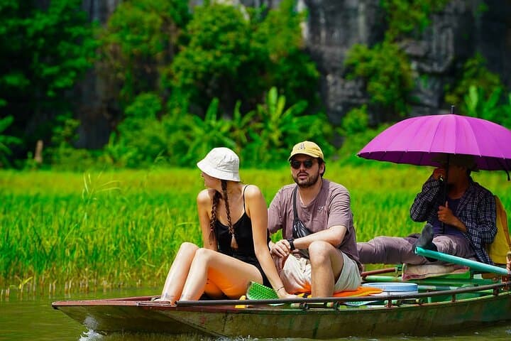 Tam Coc & Hoa Lu Day Tour: Boat Caves, Rice Paddies, and Mua Cave Views