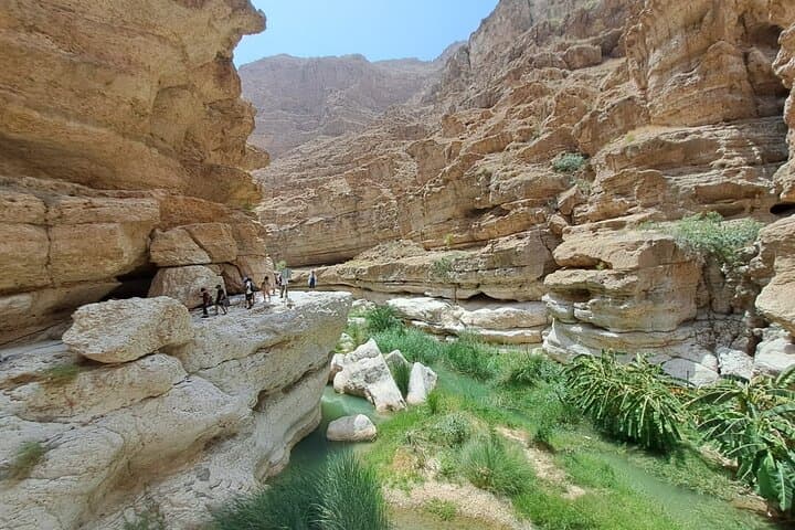 Guided Wadi Shab Hike in Oman: Canyons, Turquoise Pools, and the Waterfall Cave