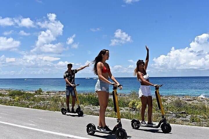 Cozumel Clear Boat & Electric Scooter Tour: Snorkel, Tequila and Beach Club Relaxation photo 4