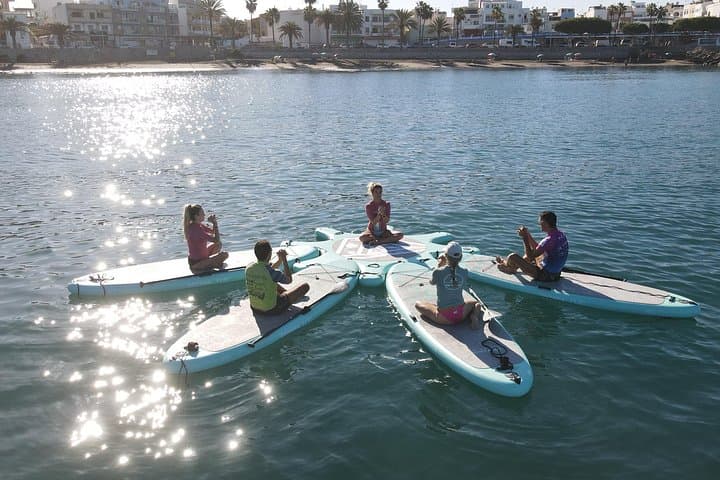 Sup Yoga in Gran Canaria: Small-Group Paddleboard Yoga in Arguineguín photo 2