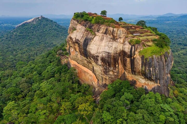 Sigiriya Rock & Dambulla Cave Temple Day Tour from Pasikudah — Climb, Caves and Cultural Treasures