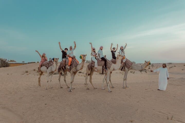 Sunrise Dune Drive in Dubai: Camel Trek, Sand Surfing & Red Dunes Photo Stops photo 6