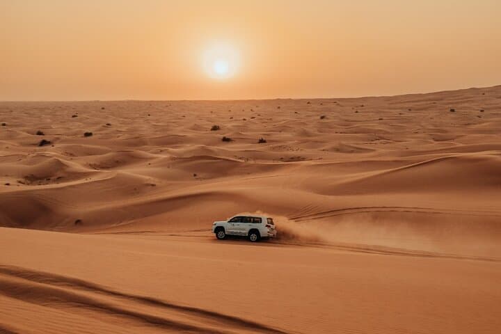 Dubai Red Dunes Deluxe: ATV Self-Drive and Evening Desert Camp Dinner photo 6