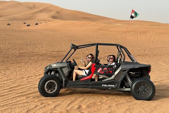 Dubai Red Dunes Deluxe: ATV Self-Drive and Evening Desert Camp Dinner