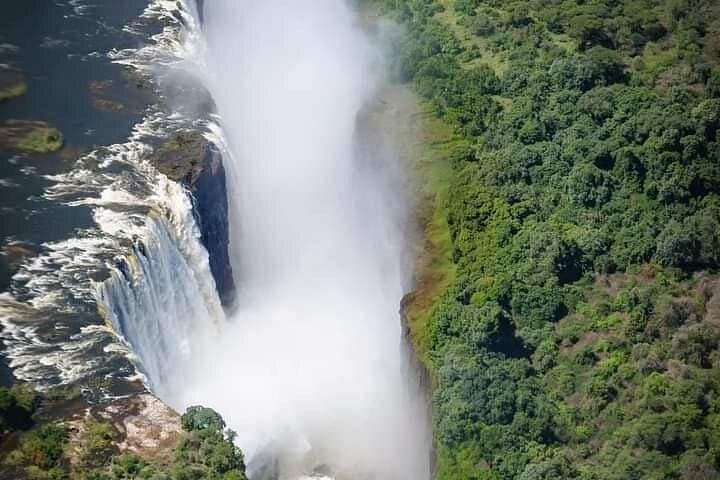 Private Guided Tour of Victoria Falls: Sunrise, Day & Luna Rainbow Experiences photo 2