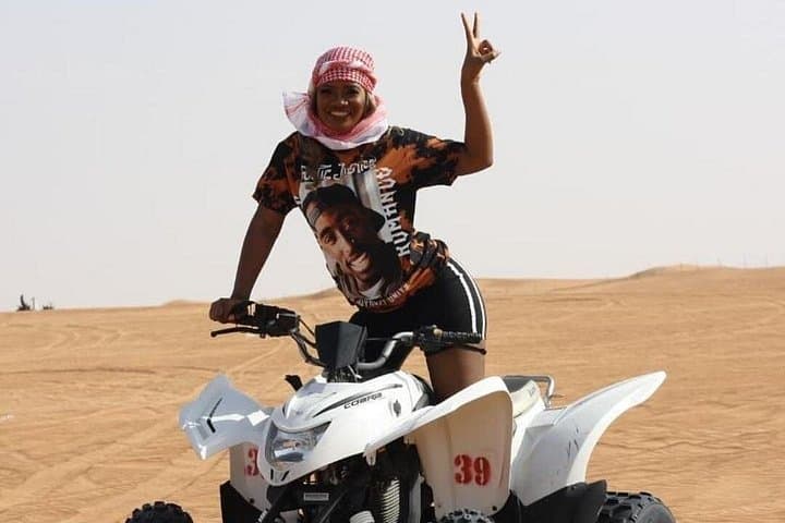 Dubai Red Dune Safari: Quad Bike, Sandboarding & Bedouin Camp Experience photo 3