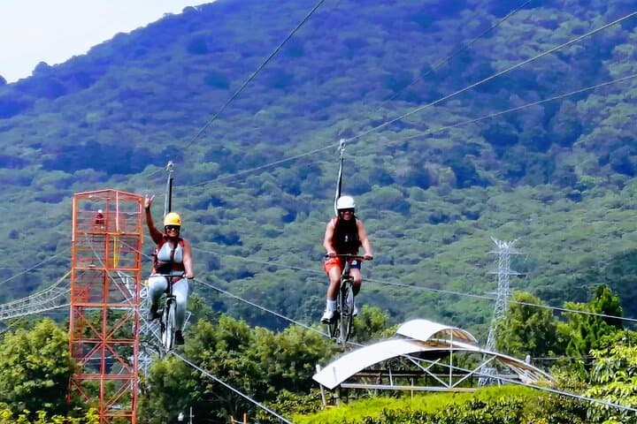 Private Roundtrip to Cafe Albania and NAWI Beach House from San Salvador