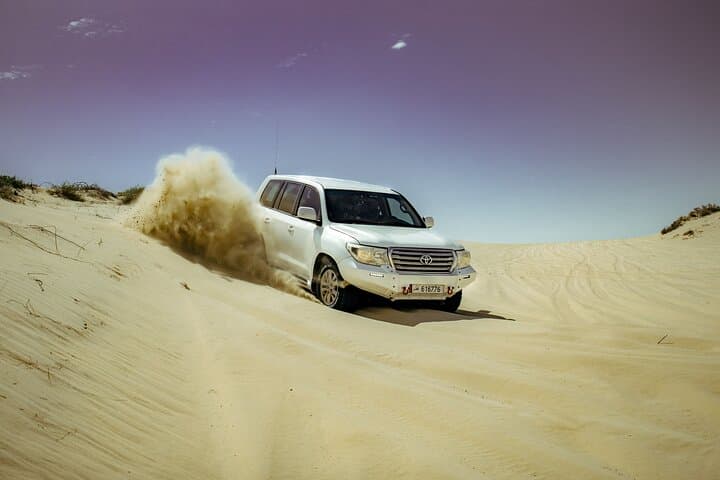 Overnight Desert Safari from Doha — Dune Bashing, Camp BBQ & Sunrise Photography
