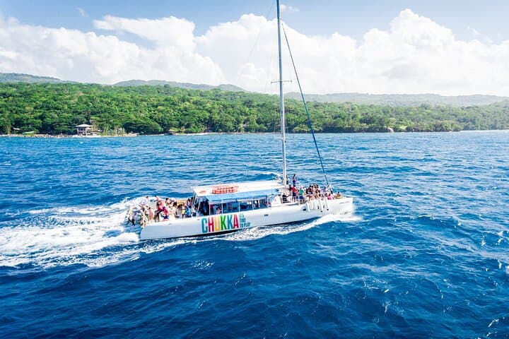 Party Catamaran Cruise from Montego Bay with Dunn's River Falls Climb and Snorkel photo 2