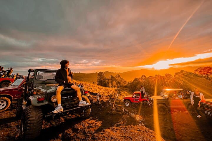 Experience Mount Batur Sunrise by 4WD Jeep: Lava Fields & Volcano Views in Bali