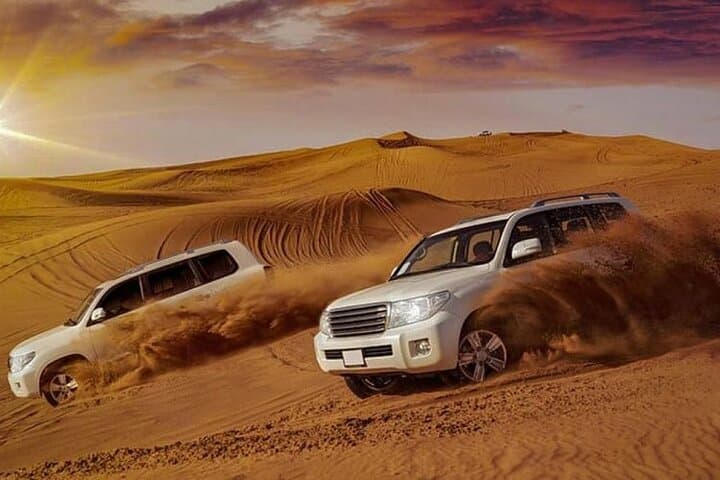 Morning Dubai Desert Safari: Private 4x4 Dune Bashing, Camel Ride & Sandboarding photo 2