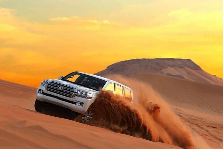 Morning Dubai Desert Safari: Private 4x4 Dune Bashing, Camel Ride & Sandboarding photo 3
