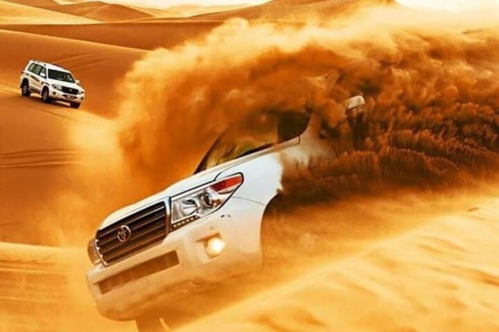 Morning Dubai Desert Safari: Private 4x4 Dune Bashing, Camel Ride & Sandboarding photo 4