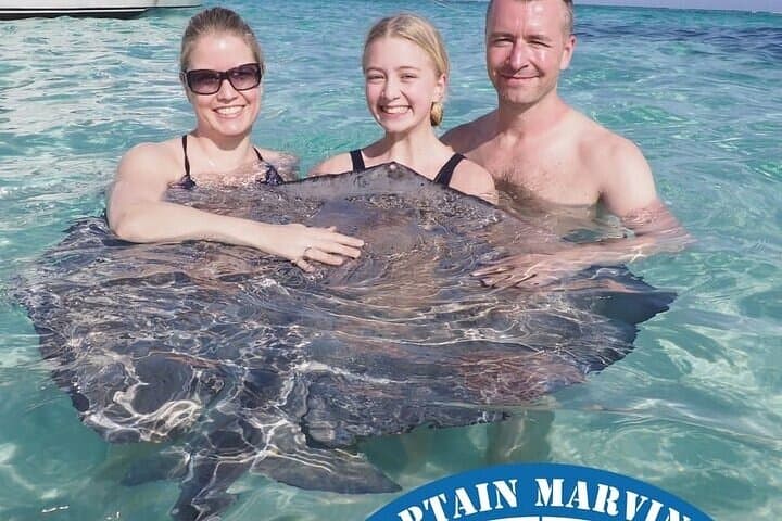 Stingray City Snorkel: Catamaran Trip to Coral Gardens & Barrier Reef photo 4