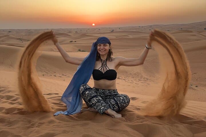 Dubai Red Dune Safari: Camel Ride, Sandboarding & BBQ Sunset Experience photo 3