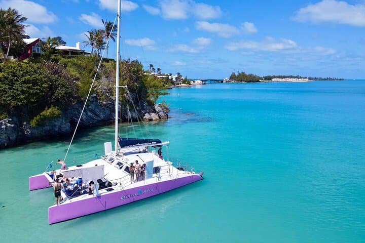 Pink Catamaran Sail and Snorkel in Bermuda: Royal Naval Dockyard to a Private Cove