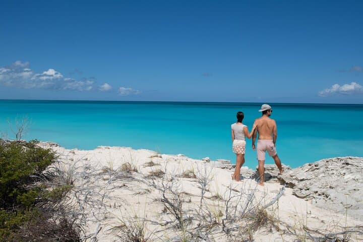 Private Full-Day Boat Charter from Grace Bay: Snorkel, Conch & Island Hopping photo 2