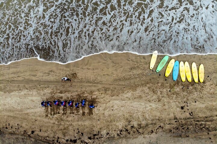 Beginner Surf Lesson at Famara Beach, Lanzarote — Half-Day Surf Experience photo 2