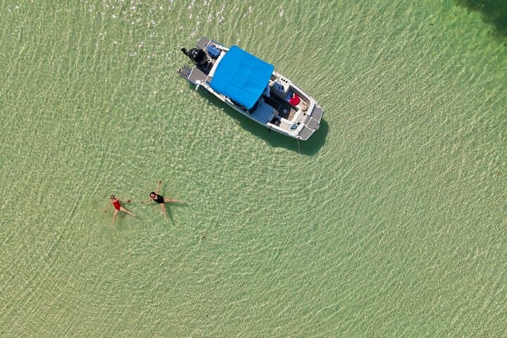 Private Guided Boat Charters in the Cayman Islands — Stingray City, Snorkel & Bioluminescence photo 3