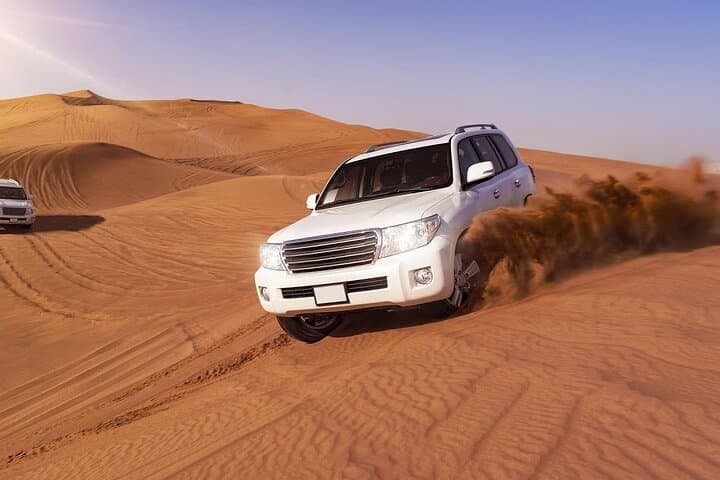 Red Dune Evening Desert Safari — Dubai Dune Bashing, BBQ & Live Mirage Show photo 3