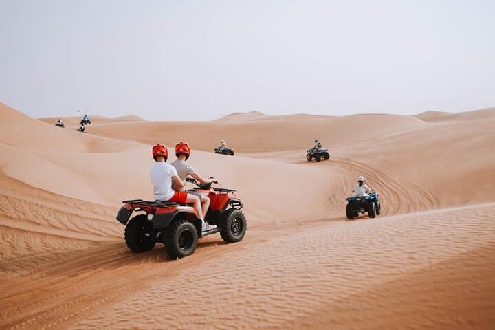 Red Dunes Half-Day ATV Adventure with Camel Ride & Sandboarding (Dubai) photo 2