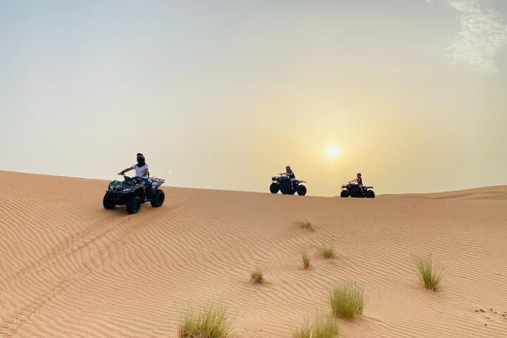 Red Dunes Half-Day ATV Adventure with Camel Ride & Sandboarding (Dubai) photo 3