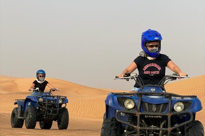 Red Dunes Half-Day ATV Adventure with Camel Ride & Sandboarding (Dubai) photo 4