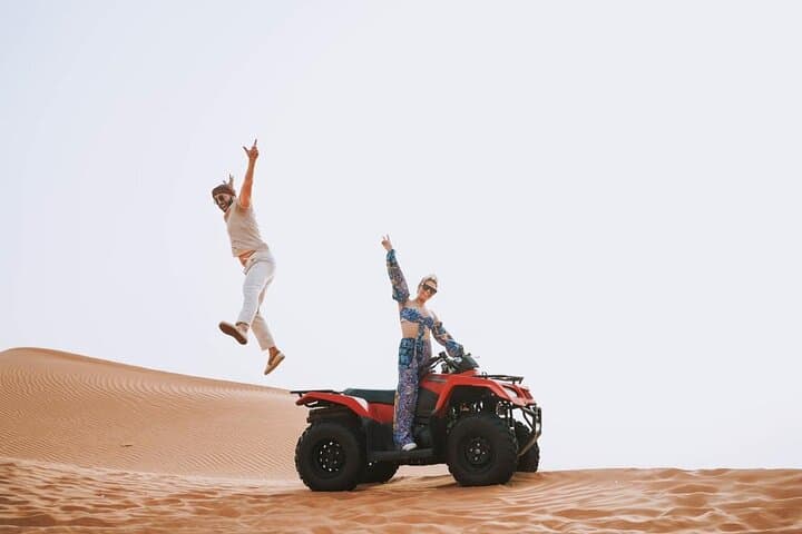 Red Dunes Half-Day ATV Adventure with Camel Ride & Sandboarding (Dubai) photo 5