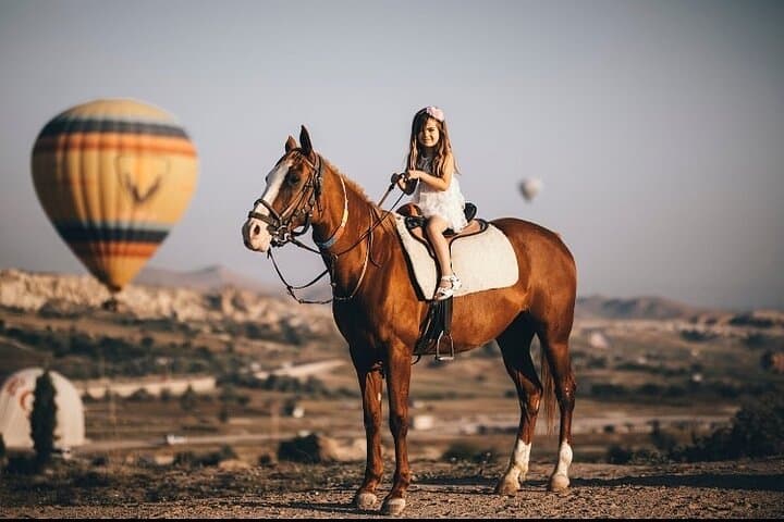 Sunrise Horse Ride Through Cappadocia's Balloon-Scattered Valleys photo 3
