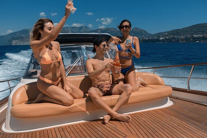 Capri Full-Day Private Boat Tour: Blue Grotillo, Faraglioni & Snorkel Stops photo 1